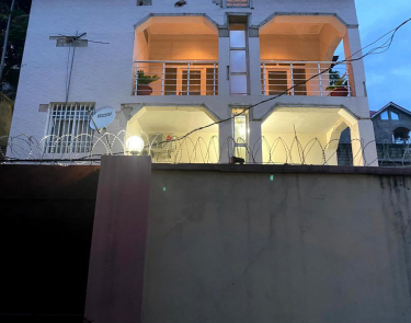 Parcelle avec maison R+1